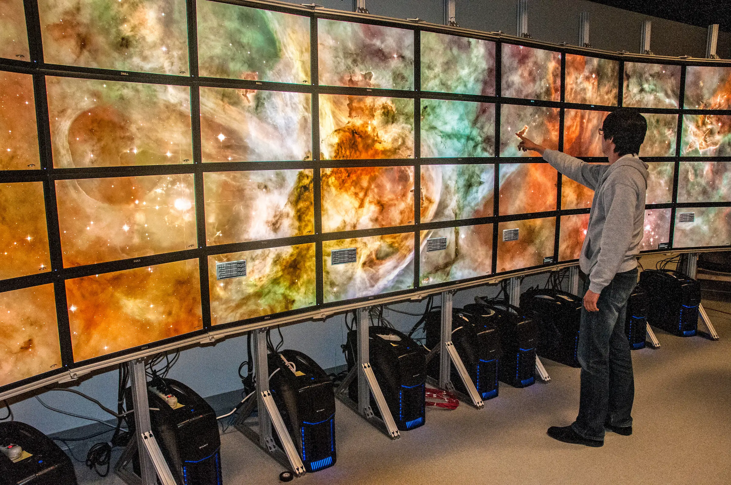 multiple screens displaying images of the galaxy
